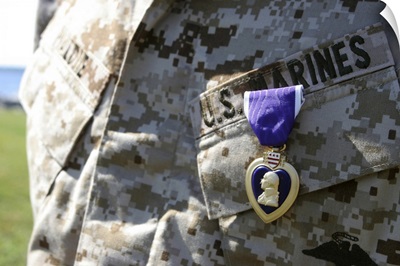 The Purple Heart award hangs over the heart of a U.S. Marine