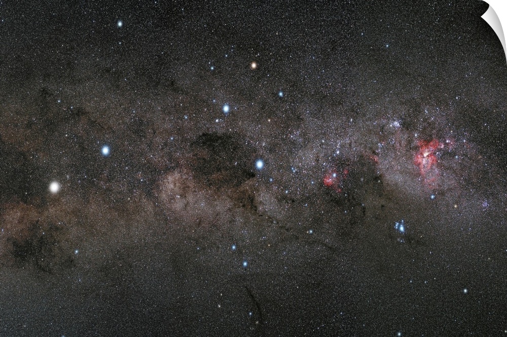 Stars and planets dot the dark sky of a photo of the Milky Way.