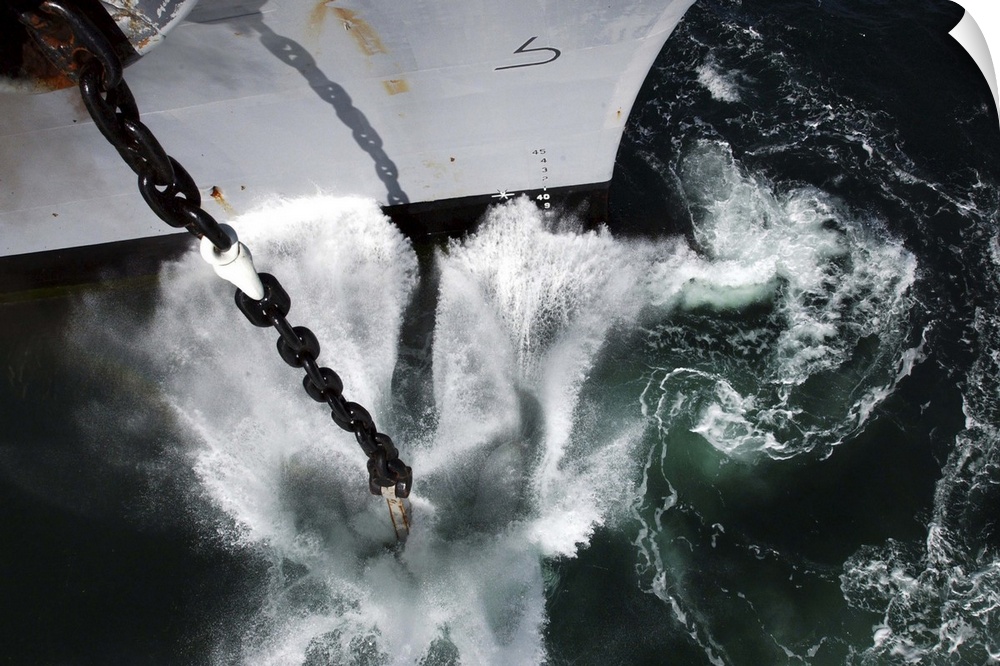 The starboard anchor of USS Ronald Reagan is released into the ocean