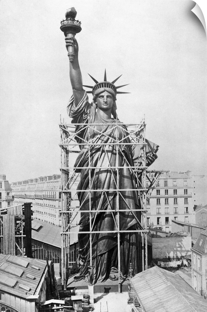 The Statue of Liberty while it was being constructed in Paris, France, under the direction of an immigrant Norwegian civil...