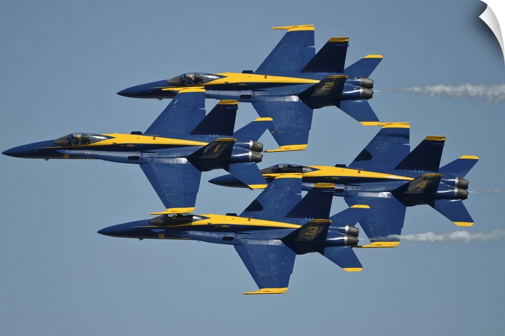 Quonset, Rhode Island, May 17, 2014 - The U.S. Navy flight demonstration squadron, the Blue Angels, fly in the Diamond for...