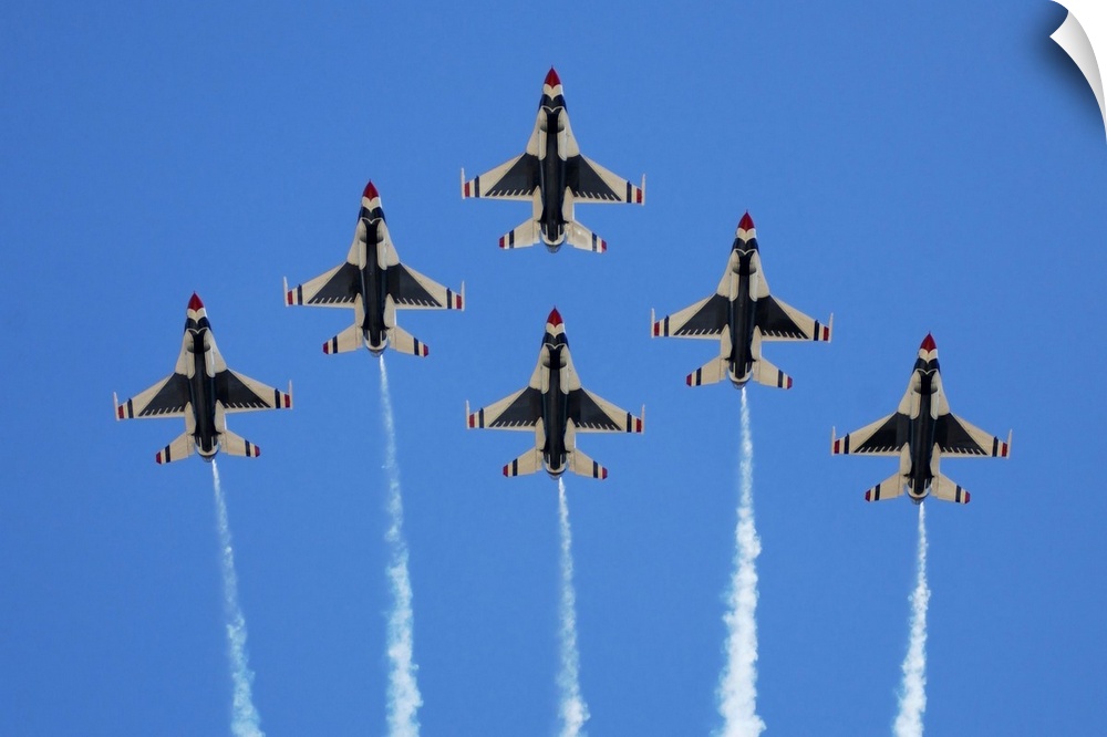 The US Air Force Thunderbirds perform a 6ship formation flyby during an air show