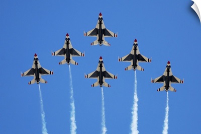 The US Air Force Thunderbirds perform a 6ship formation flyby during an air show