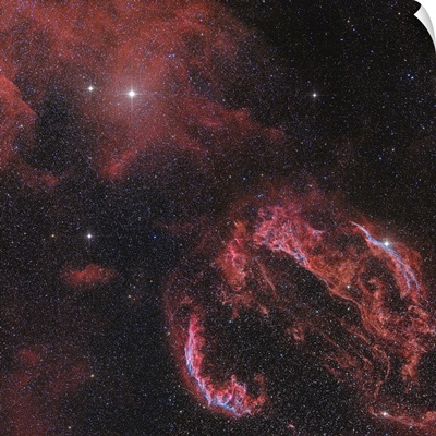The Veil Nebula in the constellation Cygnus glows red