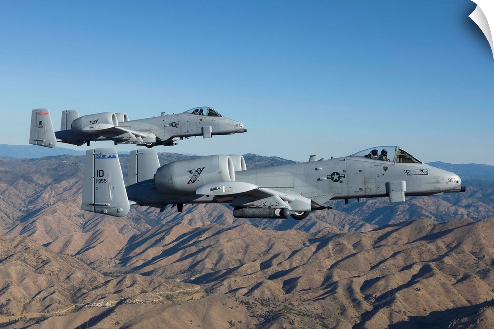 Two A-10 Thunderbolt's from the 124th Fighter Wing's 190th Fighter Squadron fly over Central Idaho.