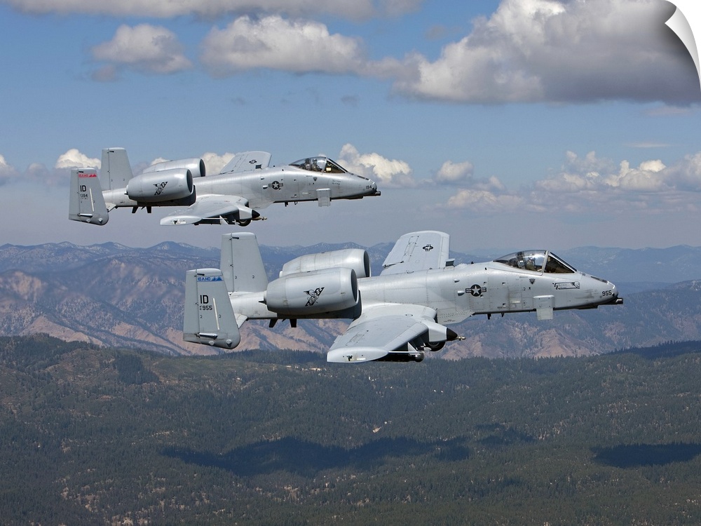 Two A-10 Thunderbolt's from the 124th Fighter Wing's 190th Fighter Squadron fly over the mountains in Central Idaho.