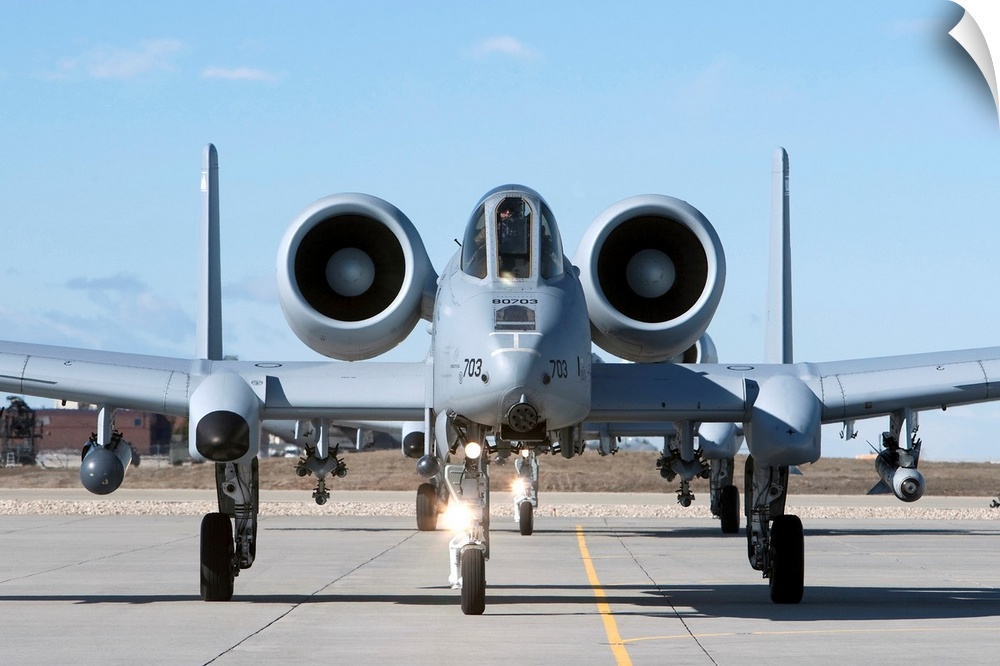 Two A-10 Thunderbolt's from the 190th Fighter Squadron taxi to the runway on a training mission out of Boise, Idaho.