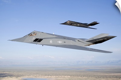 Two F-117 Nighthawk stealth fighters in flight over New Mexico