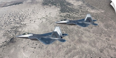 Two F-22 Raptors fly a training mission over New Mexico