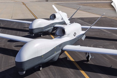 Two MQ-4C Triton unmanned aerial vehicles on the tarmac