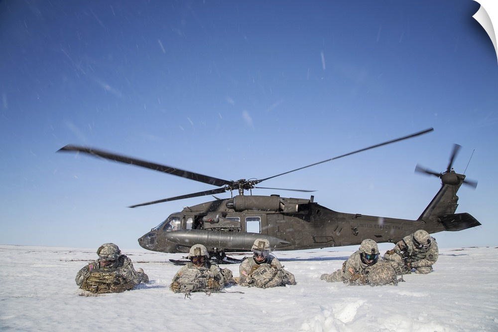May 2, 2014 - U.S. Army paratroopers pull security after exiting a UH-60 Black Hawk helicopter during exercise Arctic Pega...