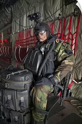 U.S. Navy Seal combat diver prepares for HALO jump operations
