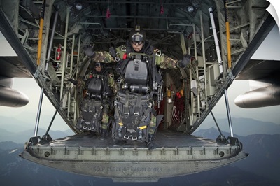U.S. Navy SEALs combat diver prepares for HALO jump operations from a C-130 Hercules