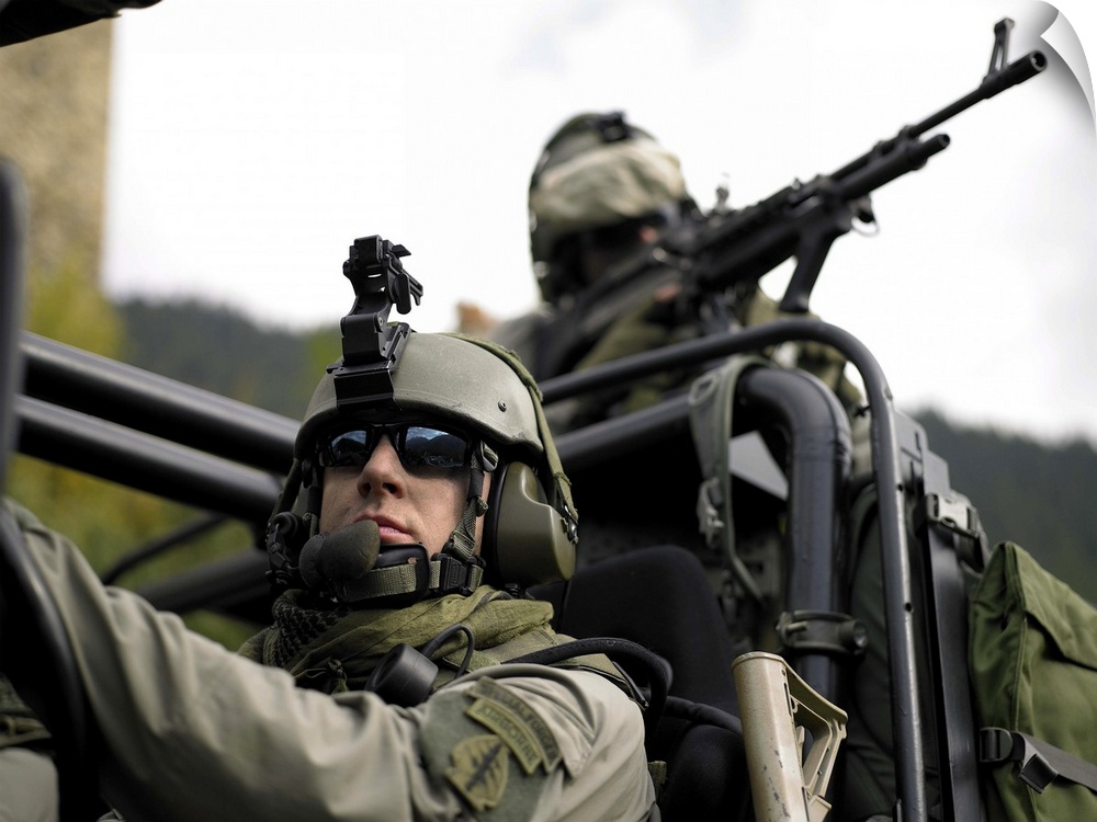 U.S. Special Forces on patrol in a special operation vehicle.