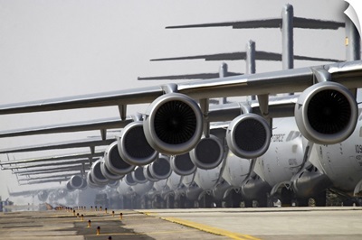 US Air Force C17 Globemaster IIIs lined up on the runway awaiting takeoff