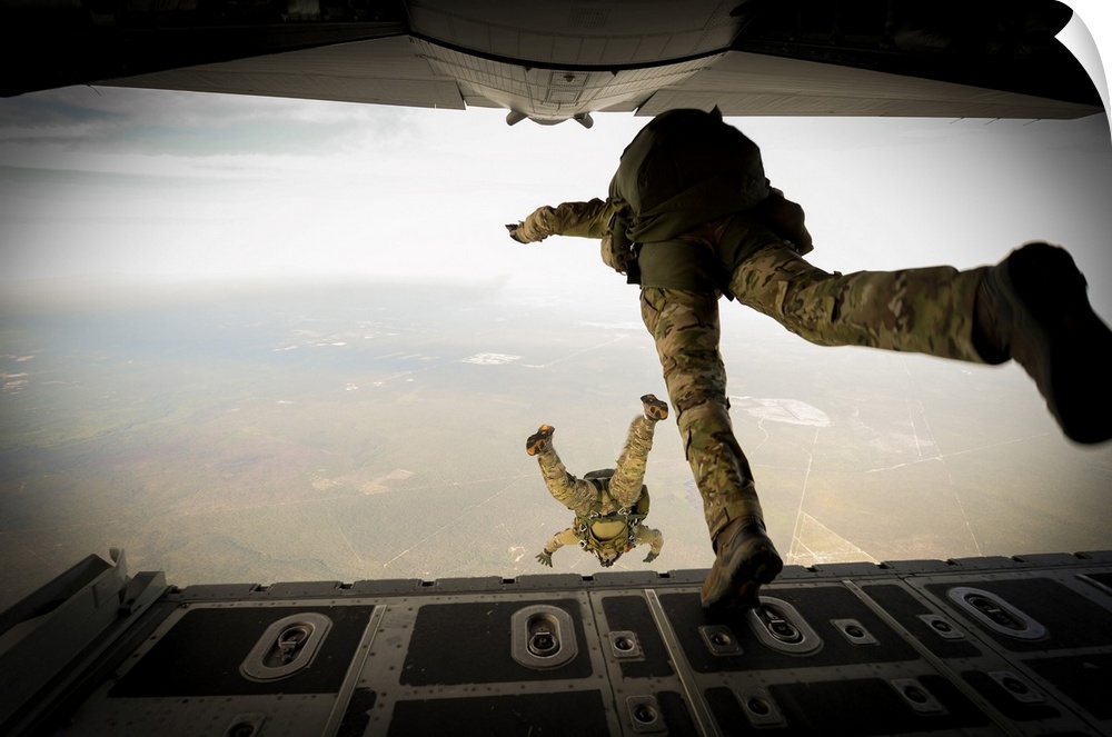 April 22, 2015 - U.S. Army Green Berets from the 7th Special Forces Group jump out of a C-130H3 Hercules for Exercise Emer...