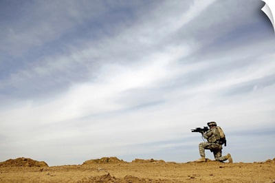 US Army Sergeant provides security during a patrol in Iraq