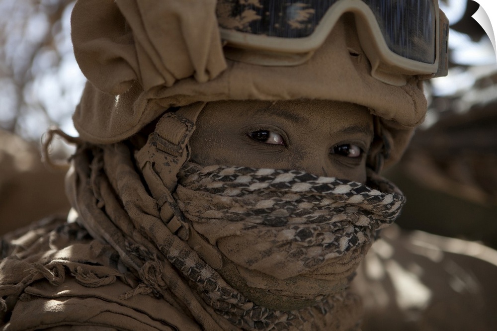 September 24, 2010 - U.S. Marine stares out of a medium tactical vehicle replacement after the dust settled during a convo...