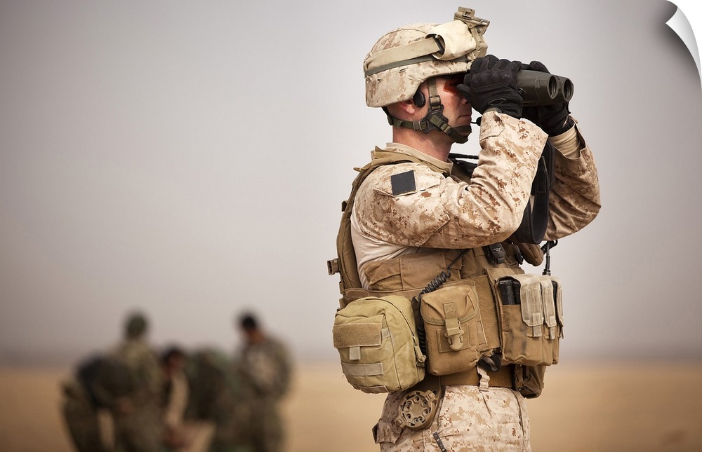 February 21, 2012 - U.S. Marine determines target placement at the Shamshad target range in Afghanistan.