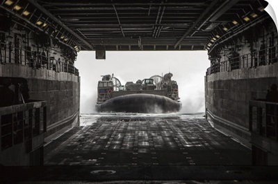 US Navy Landing Craft Air Cushion Enters The Well Deck Of The USS Green Bay