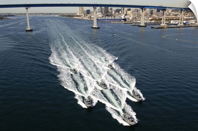 US Navy patrol boats conduct operations near the Coronado Bay Bridge in San Diego