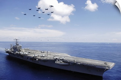 USS Abraham Lincoln and aircraft perform a aerial demonstration