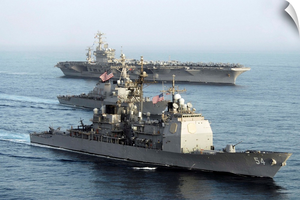 USS Antietam, USS Nimitz, and USS Higgins transit through the Gulf of Oman.
