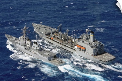 USS Decatur comes alongside the Military Sealift Command oiler USNS Pecos