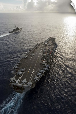 USS George Washington and USS Mobile Bay underway in the Pacific Ocean