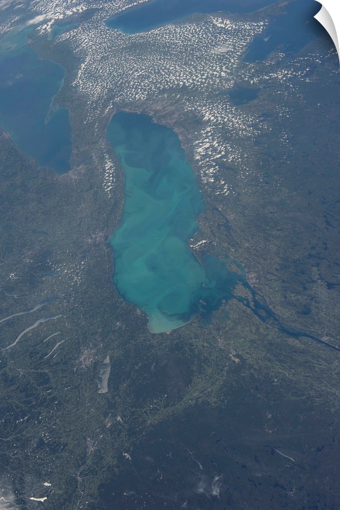 August 23, 2013 - View from space highlighting a late-summer whiting event visible across much of Lake Ontario. Such event...