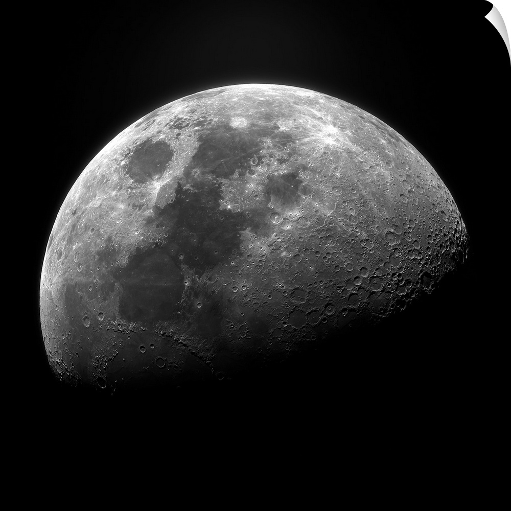 Clear photograph of one of the moon's phases showing well-defined craters, fading to the shadowy dark side.