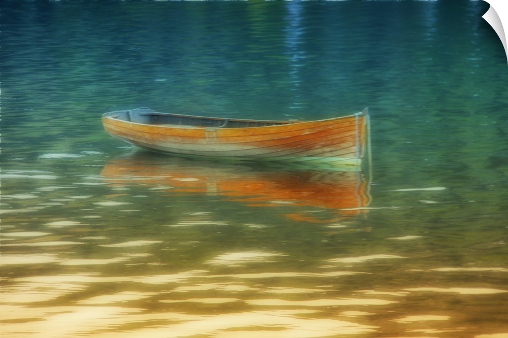 A bright orange boat floating on golden water.