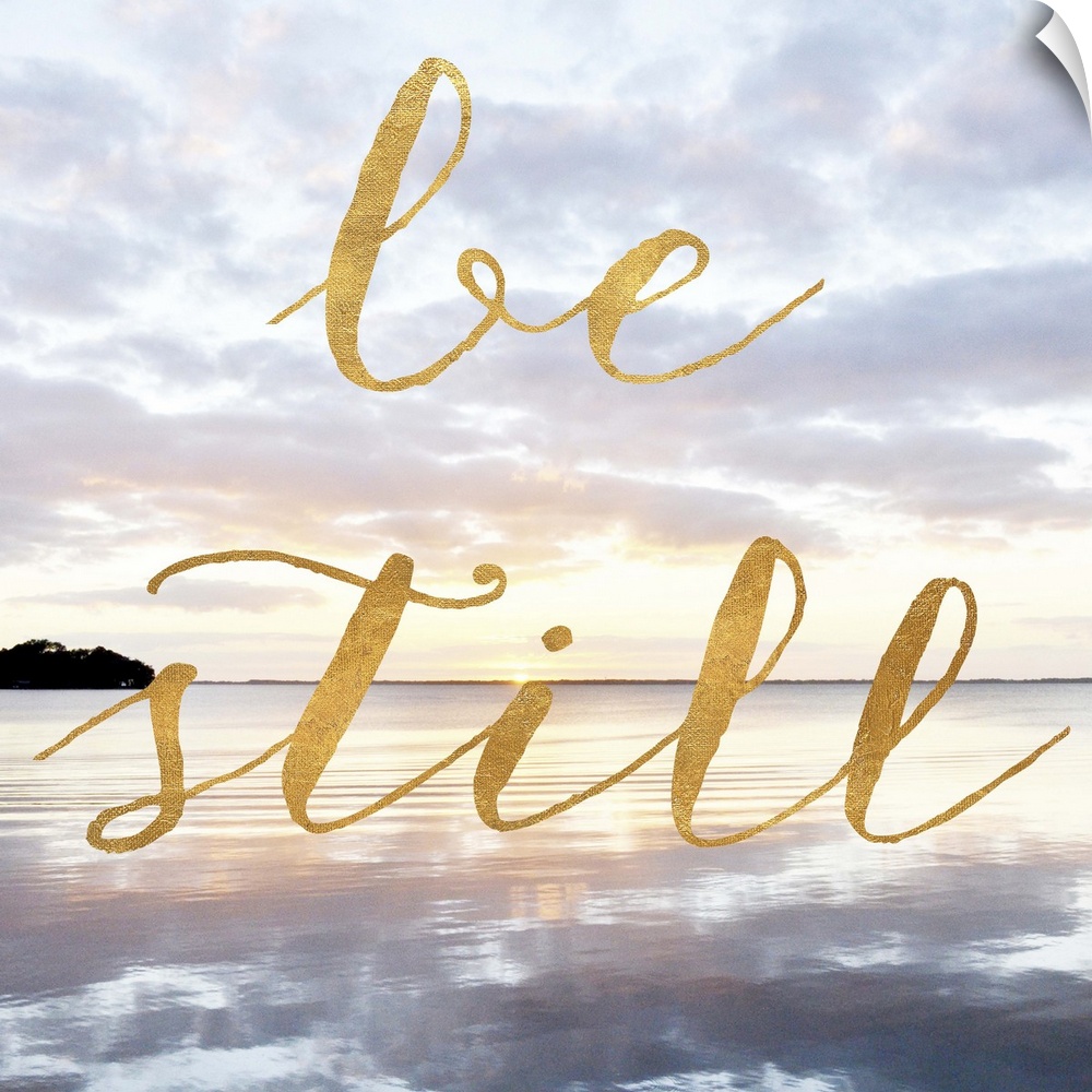 "Be Still" hand written in gold letters over an image of the sea at dawn.