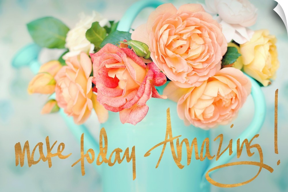 Photograph of orange and white roses arranged beautifully in a light blue watering can with the phrase "Make today amazing...