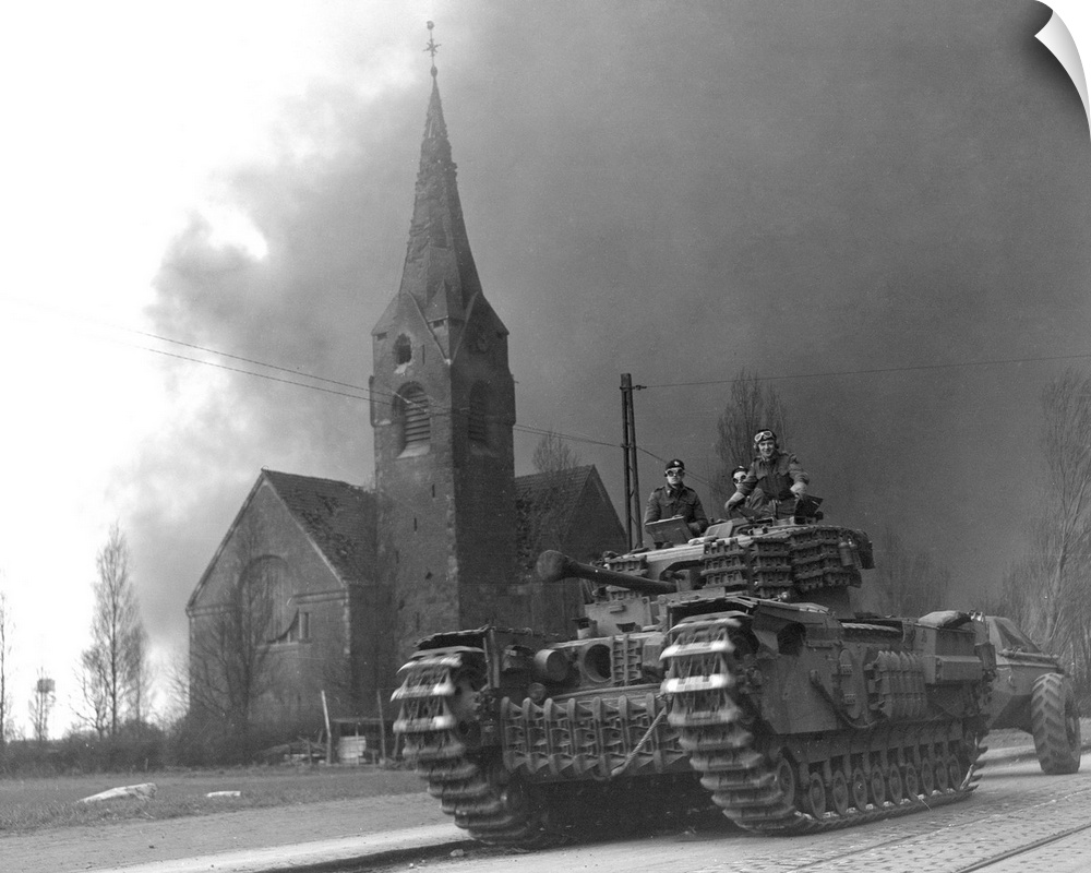 A British Churchill flame throwing tank in Sterkrade, Germany, against a background of smoke from the synthetic oil refine...
