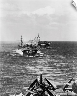 A fleet of aircraft carriers led by USS Langley, 1944