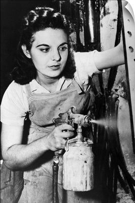 A Woman Spraying Paint On Electrical Control Equipment In A Factory, 1942