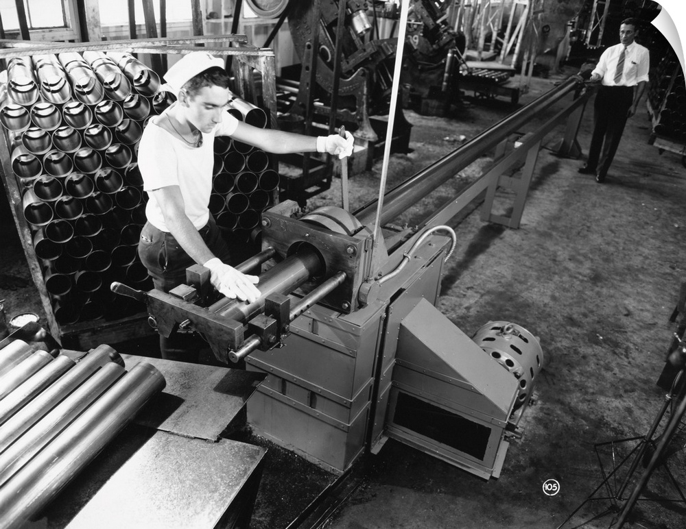 A worker at a tube cutting machine in a factory in Louisville, Kentucky. Photograph, 1945.