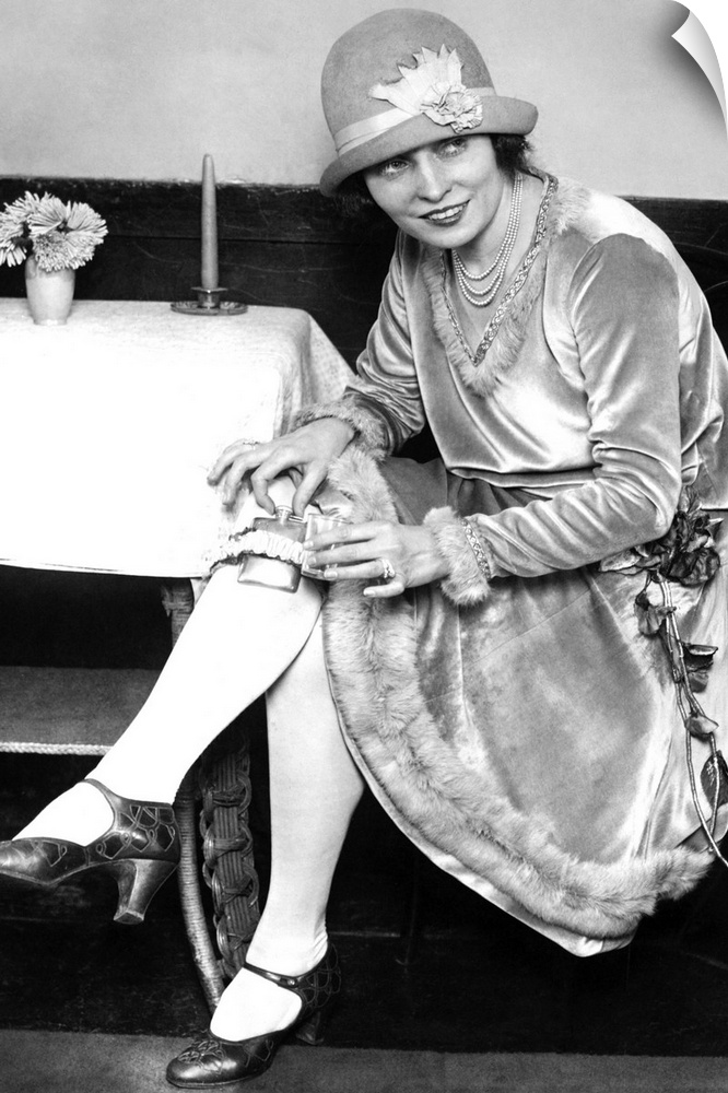 A young woman wearing a hidden flask in her garter in Washington, D.C. Photograph, 1926.