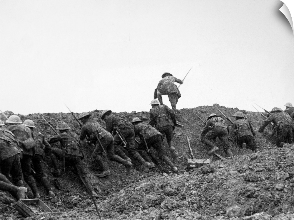 Allied troops 'going over the top,' or advancing over their own trench during the Battle of the Somme. Photograph, 1916.