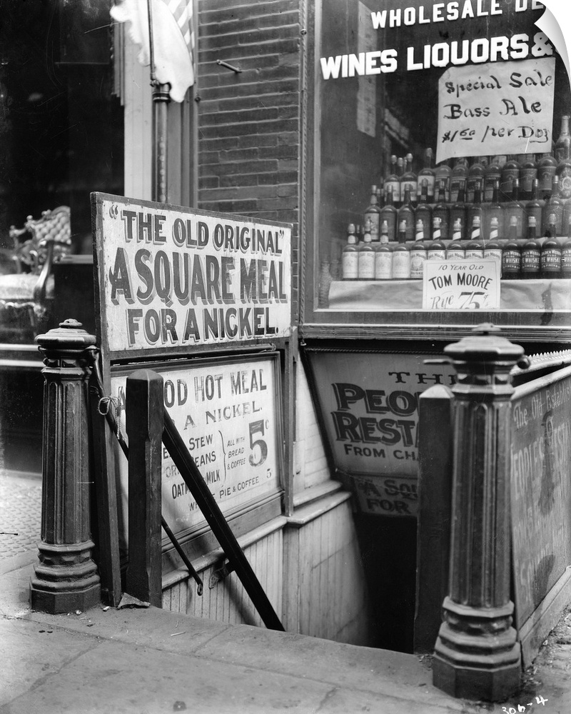 An entrance to The People's Restaurant on The Bowery in New York City. Photograph, c1920.