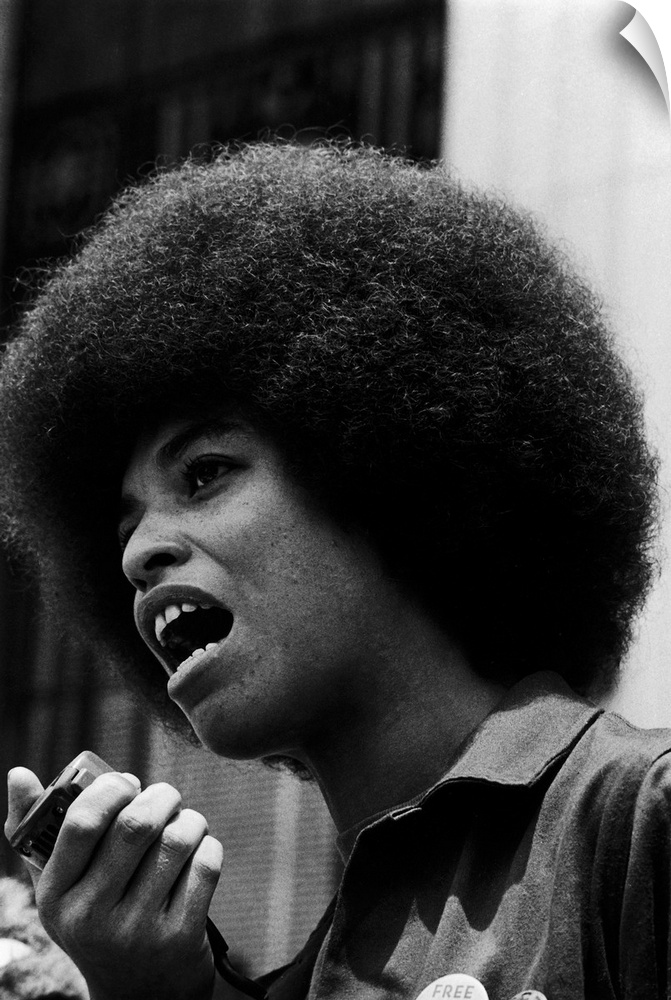 ANGELA DAVIS (1944- ). American political activist. Speaking to the press at the University of California at Los Angeles, ...