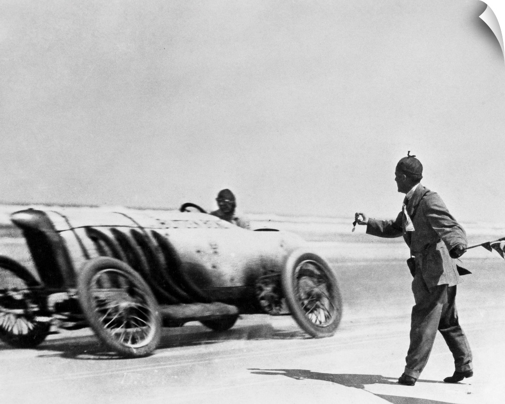 American automobile racer Barney Oldfield setting a record speed of 131.7 miles-per-hour in his Blitzen Benz, at Daytona B...