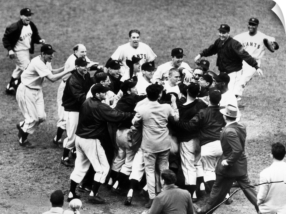 Bobby Thomson of the New York Giants being mobbed by teammates and fans after hitting his pennant-winning home run, the so...