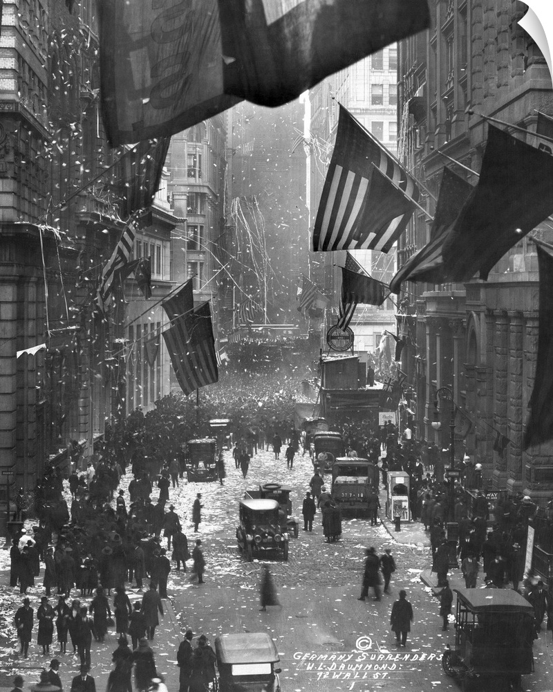 Celebrations on Wall Street in New York City, following the Armistice with Germany after World War I. Photograph, 1918.