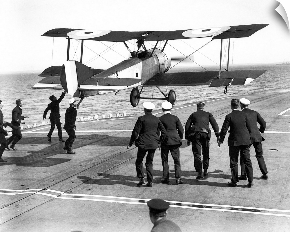 Squadron Commander Edwin Harris Dunning landing his Sopwith Pup biplane on the HMS 'Furious,' the first plane ever to be l...