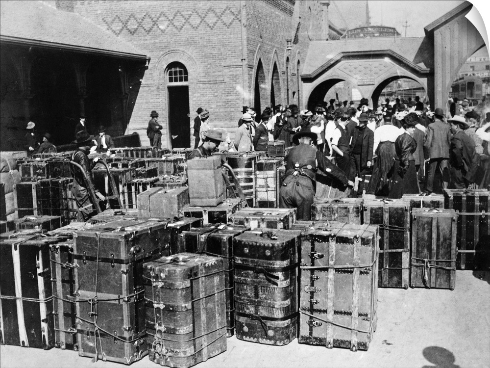 Trunks at Ellis Island belonging to arrivals debarking for New York, c1900.