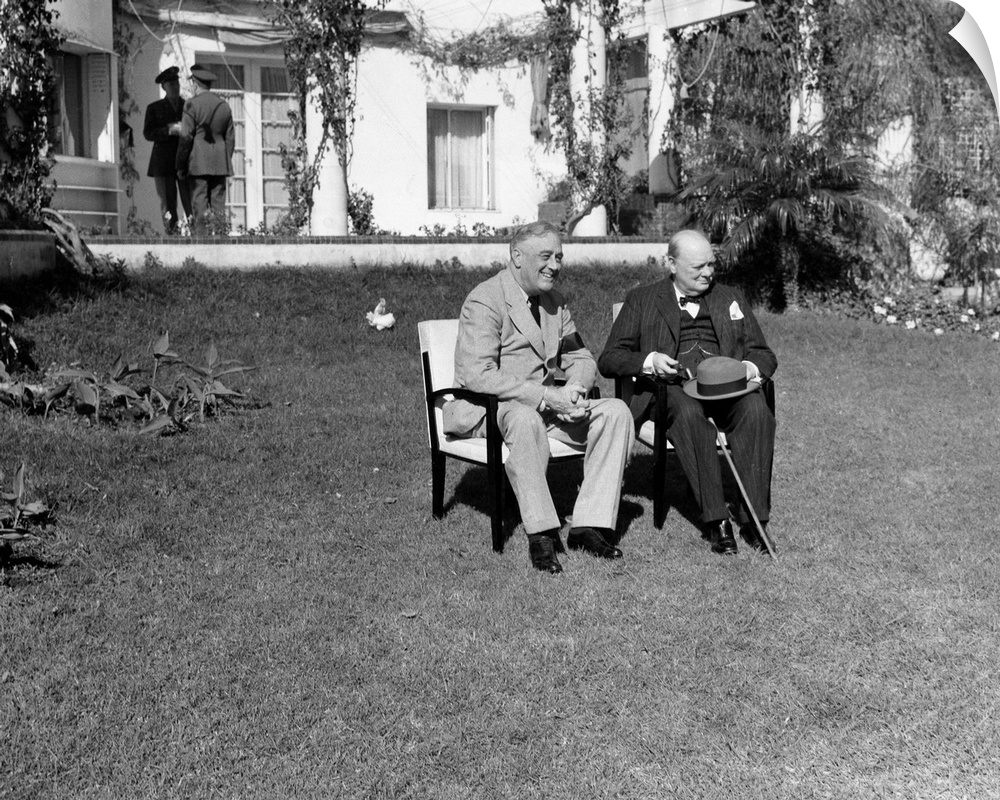 President Franklin D. Roosevelt of the United States and Prime Minister Winston Churchill of Great Britain (right) photogr...