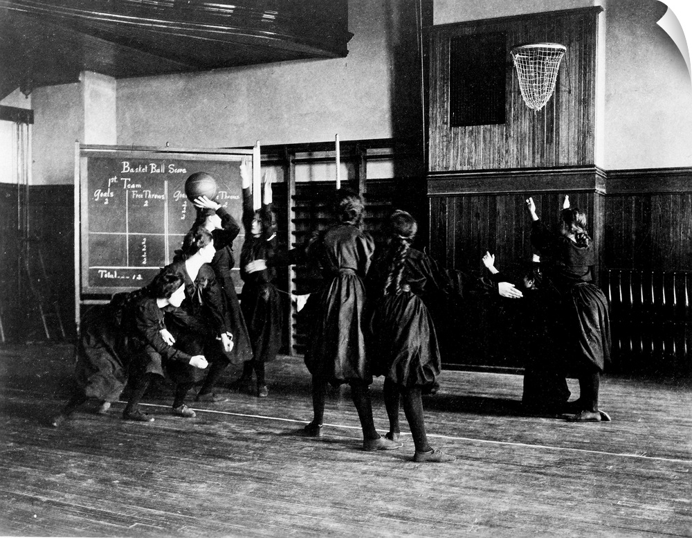 Girls playing basketball in Western High School, Washington, D.C. Photographed by Frances Benjamin Johnston, 1899.