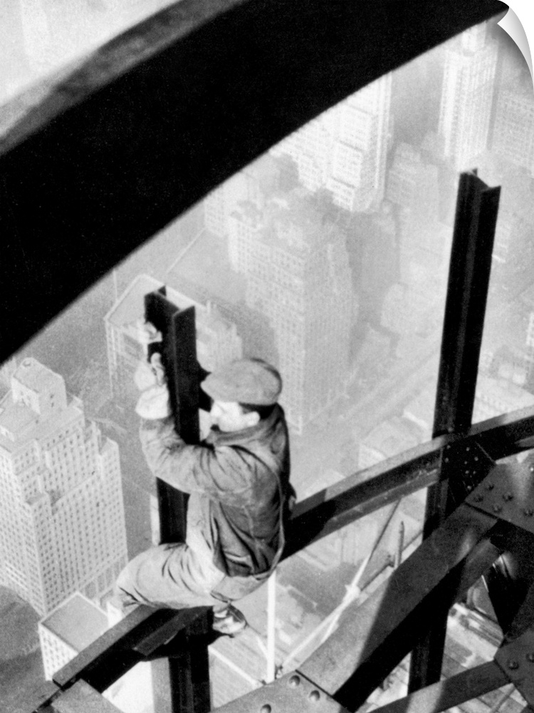 Steelworker atop the Empire State Building, New York City, during its construction. Photograph by Lewis Hine, 1931.